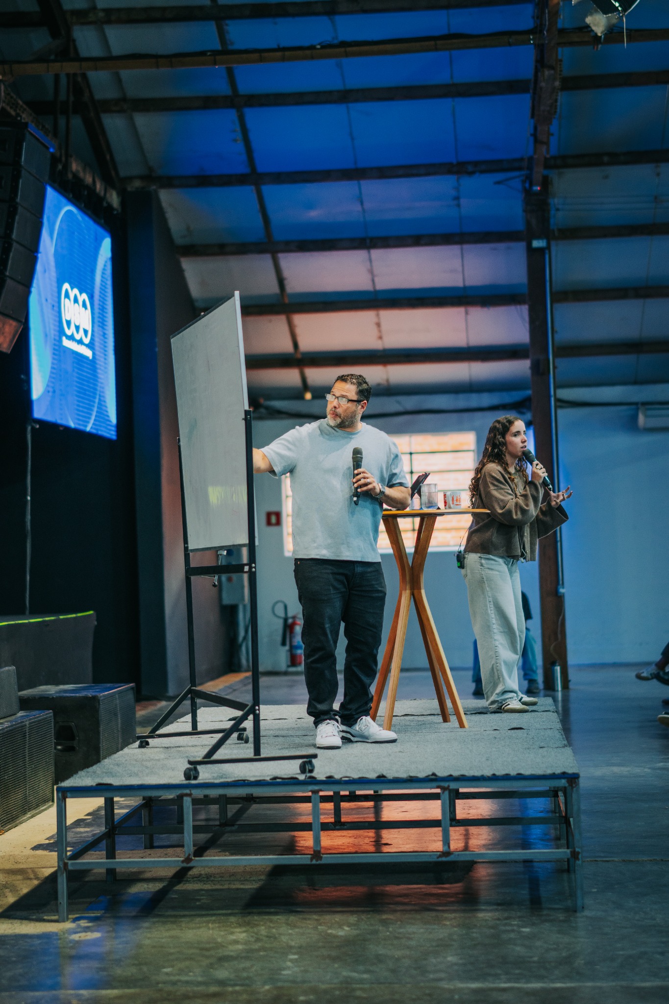 Dr. Ivan Roman teaching with a whiteboard